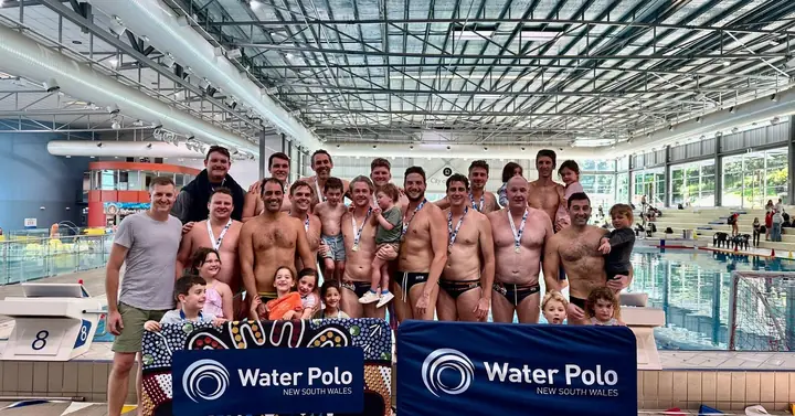 Men's squad with medals